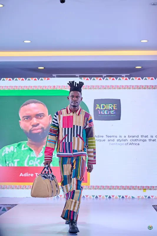 An Adire Teems patchwork suit on the runway