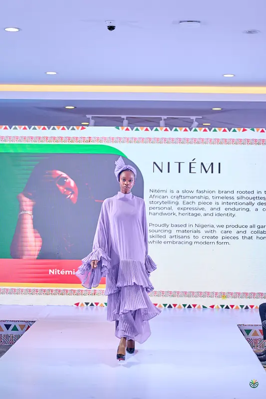A lilac layered gown from Nitemi on the runway