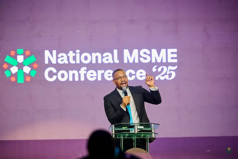 A speaker opens the day at the National MSME Conference '25 podium